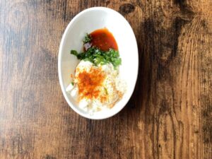 Ingredients for creamy Greek yogurt dipping sauce in a bowl.